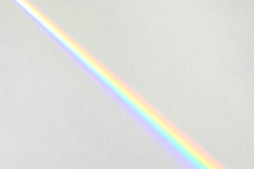 Overlay effect for photo and mockups. Wall texture with organic drop diagonal shadow and rays of light from window on a white wall.