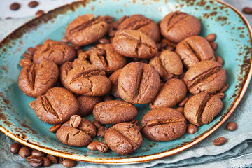 Pile of delicious  cookies on  blue ceramic plate, selective focus closeup