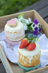 Wooden tray with strawberry cake