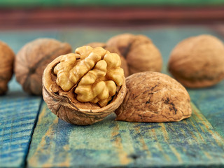 Walnuts lie on a light colored background