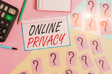 Writing note showing Online Privacy. Business concept for involves the control of what information...
