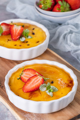 Creme brulee - traditional french vanilla cream dessert with caramelised sugar on top. Leite creme, portuguese desert