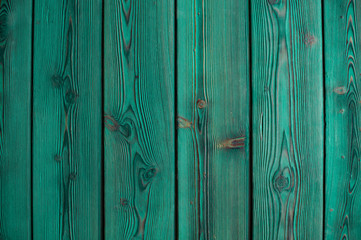Photo of a wooden green background. Top view