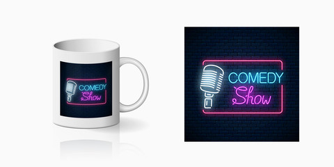 Neon print of comedy show sign with retro microphone on cup mockup. Branding identity design on mug of a nightclub with comedy battle. Humor monolog glowing icon. Vector shiny design element