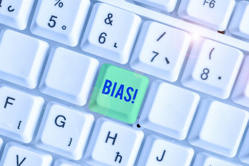 Writing note showing Bias. Business concept for inclination or prejudice for or against one...
