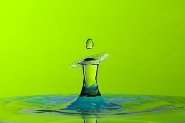 Abstract photograph of a water drop collision created with two water drops splashing together...