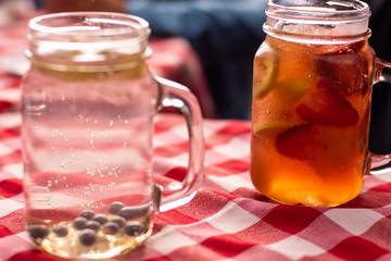 Fresh tropical beverages served in a jar made with ice and delicious fruits at gourmet restaurant
