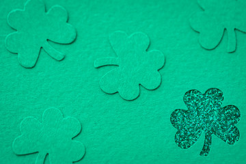 St Patrick's day background with shamrock clover leaf, Irish festival symbol, selective focus