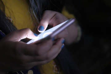 Close up of women use smart phone at night  © Towfiqu Barbhuiya 