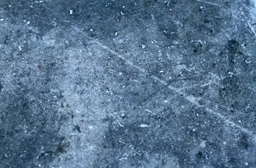grey and blue concrete background with specks and scratches