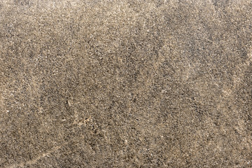 Wall background with beige stone, brown tile surface texture