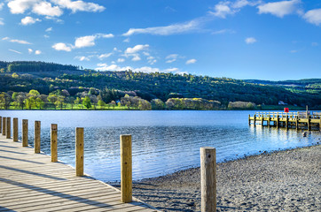 A view of Lake Coniston from the jetties in Cumbria showing both jetties without people. .