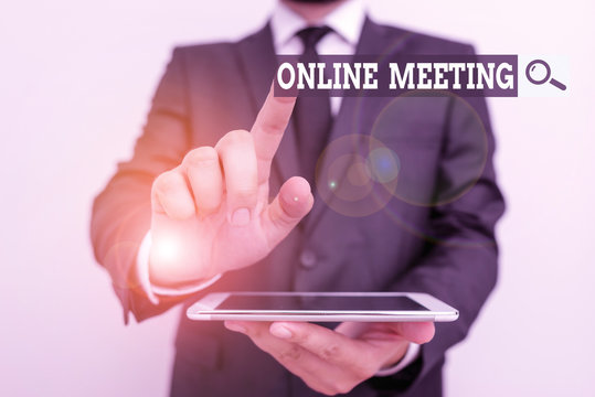 Handwriting Text Online Meeting. Conceptual Photo A Meeting That Takes Place Over An Electronic Medium Male Human Wear Formal Clothes Present Presentation Use Hi Tech Smartphone