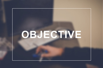 Objective word with business blurring background