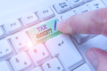 Word writing text Tax Amnesty. Business photo showcasing limitedtime opportunity for specified...