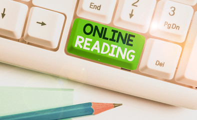 Conceptual hand writing showing Online Reading. Concept meaning process of extracting meaning is in...