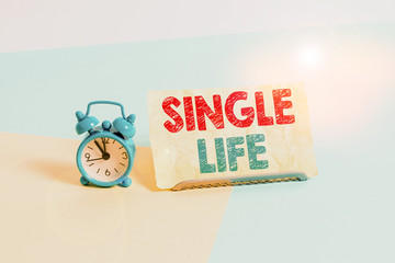 Writing note showing Single Life. Business concept for not vowed to someone or something else...