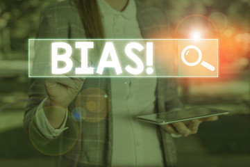 Conceptual hand writing showing Bias. Concept meaning inclination or prejudice for or against one...