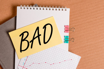 Writing note showing Bad. Business concept for Unpleasant things that happen to showing Effects...