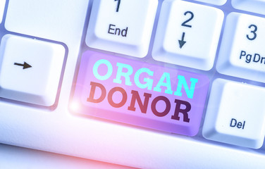 Conceptual hand writing showing Organ Donor. Concept meaning the act of donating an organ to a...