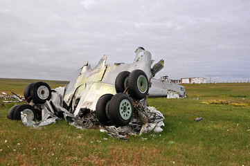 Plane crash. The destroyed plane lies in a field