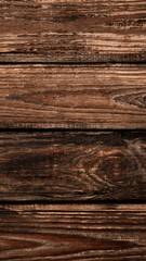 Fototapeta premium Vertical ancient wooden door background. Wallpaper for your device