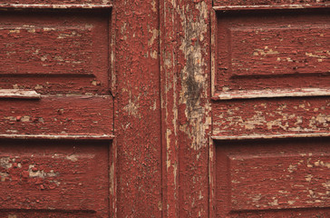 Close-up of the weathered old brown wood door background