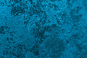 Rusty metal wall, old sheet of iron covered with rust with multi-colored paint background texture