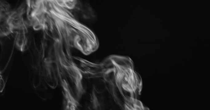 Realistic smoke against dark background UHD Footage