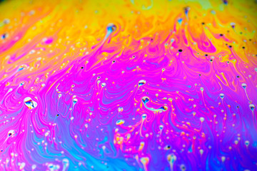 Macro photo of a rainbow soap bubble