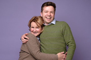 Grandmother with young grandson in the studio