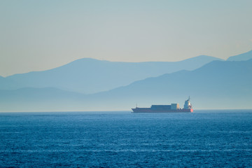 Fototapeta premium Cargo vessel ship in Aegean Sea