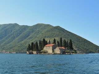 Island of St. George, one of two islet landmarks on Kotor Bay in Perast, Montenegro - 326186721