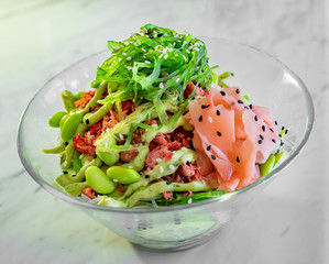 Hawaiian tuna salmon marlin wakame sesame soy cucumber avocado rice poke bowl