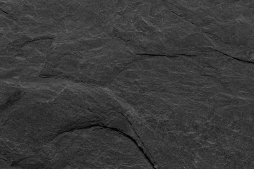 Dark grey black slate background or texture.