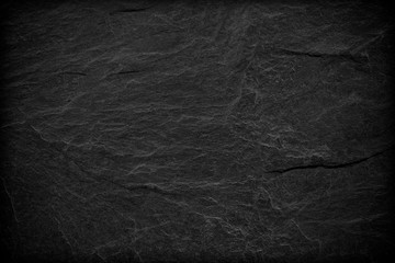 Dark grey black slate background or texture.