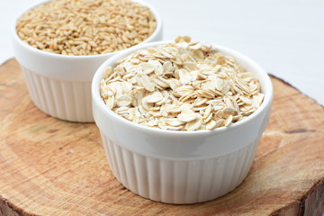 Oat grains and flakes in containers for display