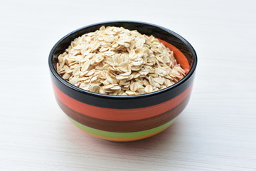Oat grains and flakes in containers for display