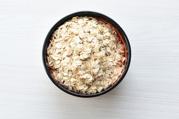 Oat grains and flakes in containers for display