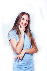 young pretty teenage hipster girl posing emotional happy smiling on white background, lifestyle people concept