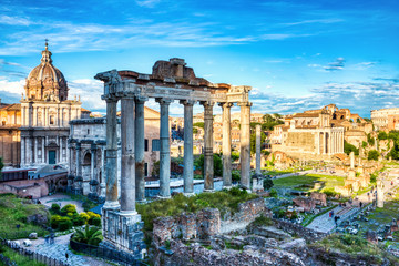 Fototapeta na wymiar Forum Romanum Illuminated by Colorful Sunset with Bright Clouds, Rome