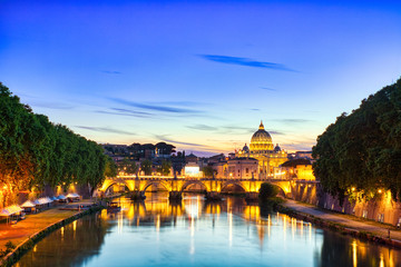 Illuminated St. Peter's Cathedral in Rome at Dusk