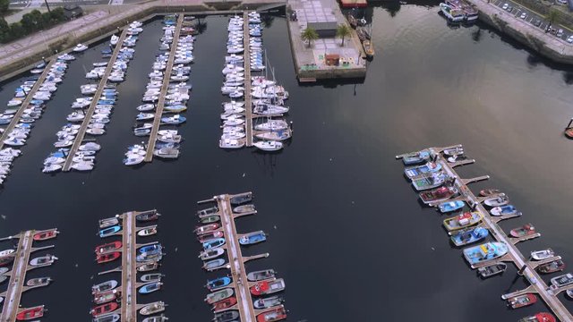 Port of coastal city in evening