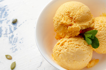 homemade pumpkin ice cream with cinnamon and seeds