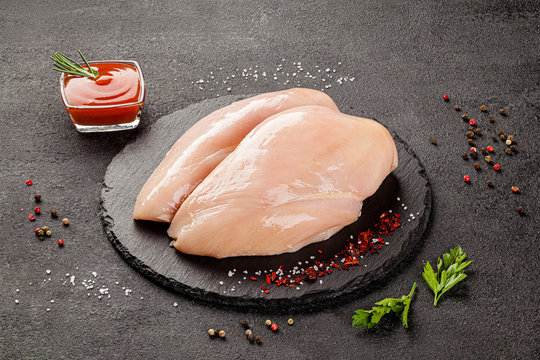 Shooting for the catalog. Raw meat products, different parts of the body. pork, beef, chicken. background image, copy space text