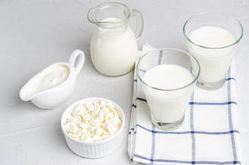 Homemade fermented milk products - kefir, cottage cheese on a white background, copy space, flat lay