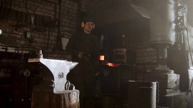 Cooling out hot metal detail in the bucket of cool water