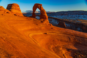 Sunlight Illuminates the Delicate Arch Formation