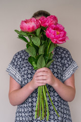 woman holding flower bouquet