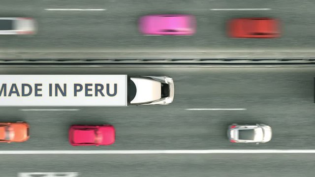 Aerial overhead view of trailer trucks with MADE IN PERU text driving along the road. Peruvian business related loopable 3D animation